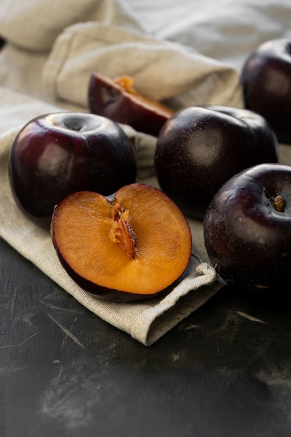 Selective focus, ripe large dark plums