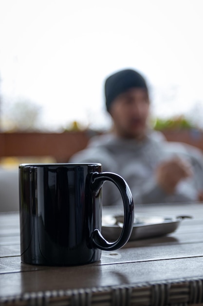 Selective focus shot of a black mug