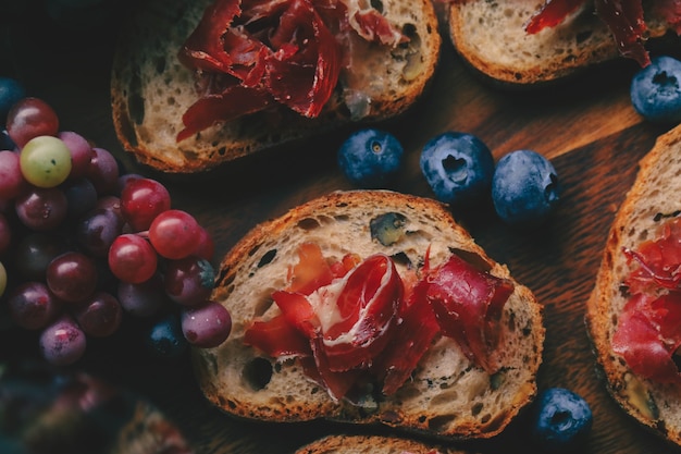 Photo selective foucs on ham jamon bellota  on wooden board