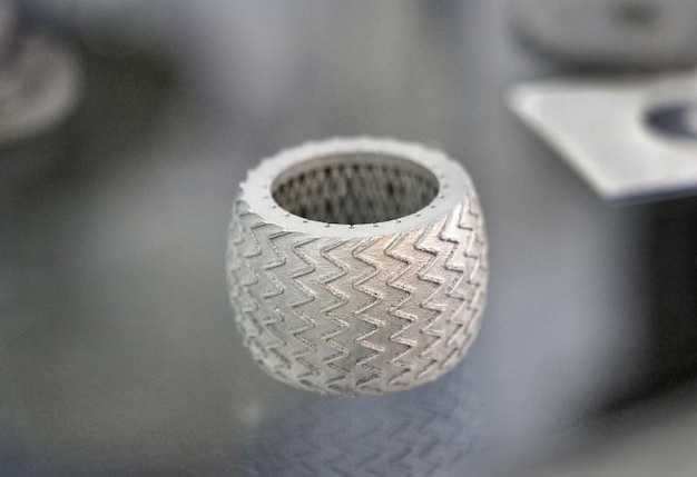 Selective Laser Melting. Object printed on metal 3d printer close-up.