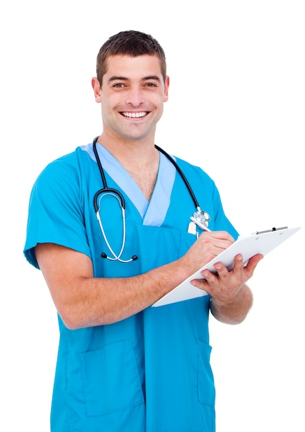 Self-assured male doctor making notes in a patient's folder 