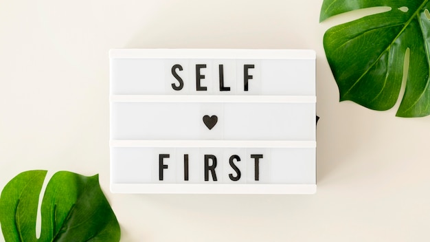 Self love first message with monstera plant