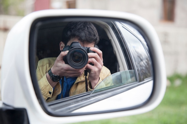 Self-portrait in car