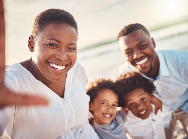 Selfie beach and black family with smile vacation and adventure for quality time cheerful and relax Portrait Nigerian parents and children on seaside holiday happiness and carefree on break