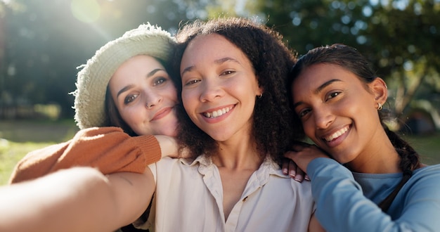 Selfie of group of women camping and nature for summer vacation with smile trees and sunshine Relax portrait of happy friends in forest on camp holiday with friendship diversity and outdoor time