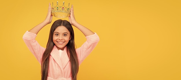 Selfishness and egoism happy egocentric teen girl in crown childhood happiness Child queen princess in crown horizontal poster design Banner header copy space