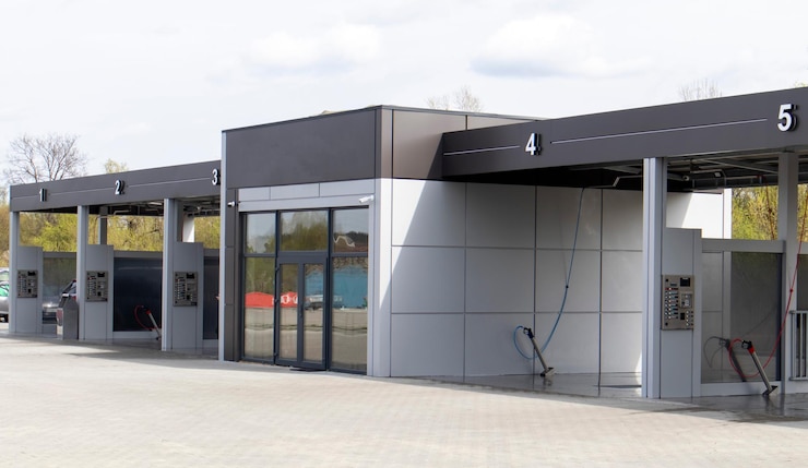 Photo selfservice highpressure car wash in the open air photo of an open selfservice car wash manual car w