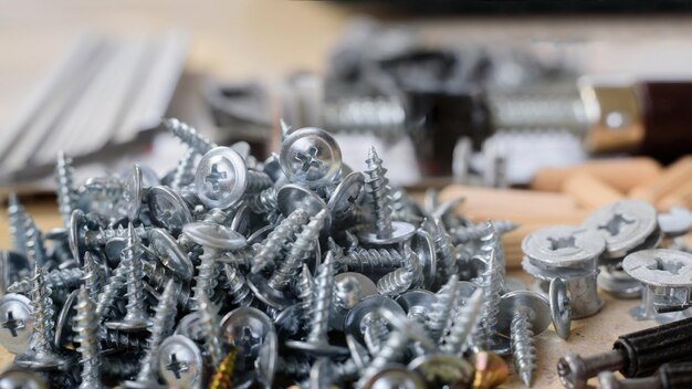 Selftapping steel screw on the desktop close up