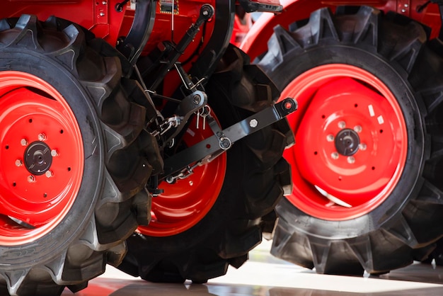 Selling colorful agricultural tractors in the showroom