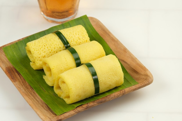 Photo semar mendem is a javanese traditional snack made of glutinous rice filled with shredded chicken