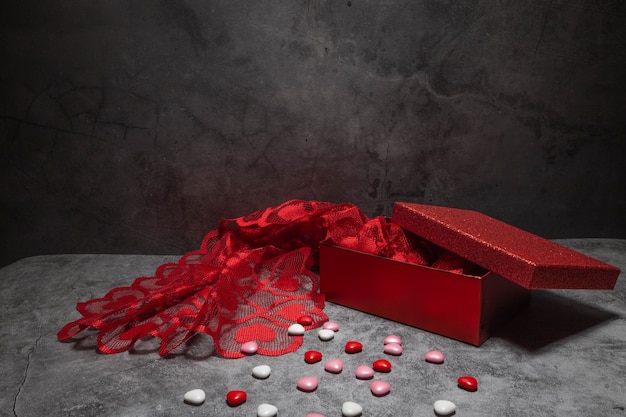 Semi-open red box with chocolates