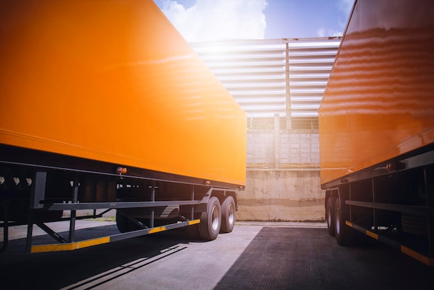 Semi trailer trucks the parking lot at the warehouse delivery\
trucks shipping cargo container