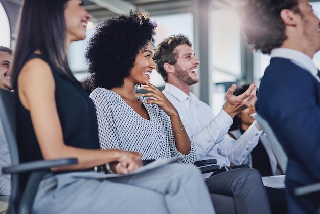 Seminars should be engaging Low angle shot of a group of businesspeople sitting in the conference room during a seminar