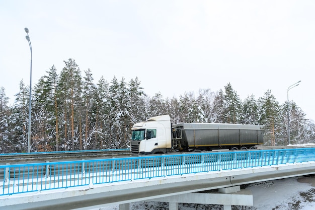 A semitrailer truck semitruck tractor unit and semitrailer to carry freight