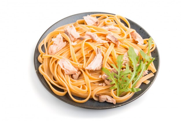 Semolina pasta with salmon isolated. side view.