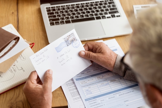 Senior Adult Reading Letter Postcard Concept