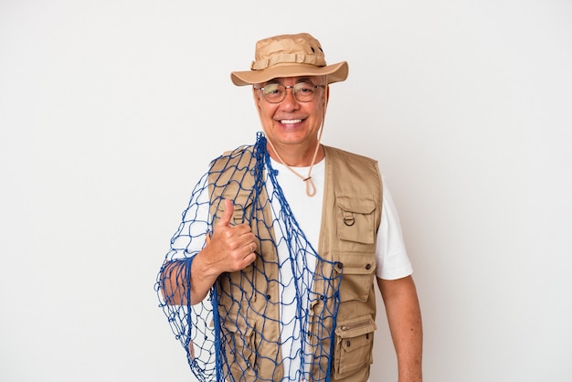 Senior american fisherman holding net isolated on white background smiling and raising thumb up