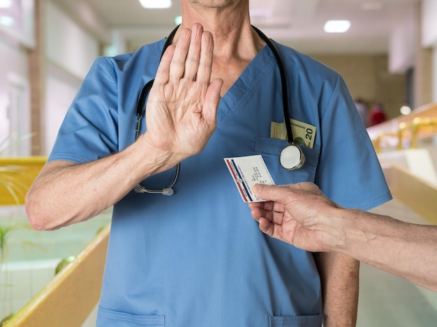 Senior arts in scrubs weigert Medicare Card