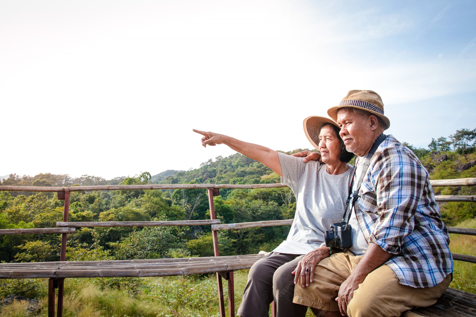 Premium Photo | Senior asian couple trekking, traveling, living a happy life in retirement healthy, can see the fresh nature. concept of health tourism for the elderly. with copy space.