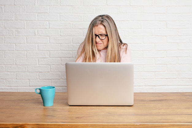 Senior businesswoman looking angry, unhappy and frustrated, 