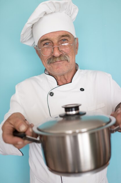 Senior cook with mustache