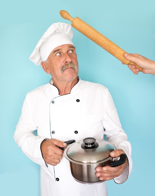 Senior cook with mustache