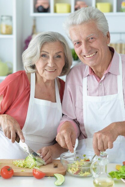 senior couple cooking