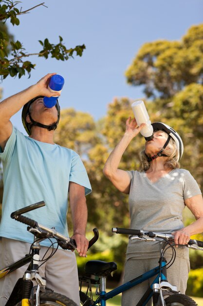 Senior couple drinking water