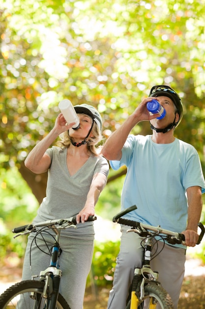 Senior couple drinking water