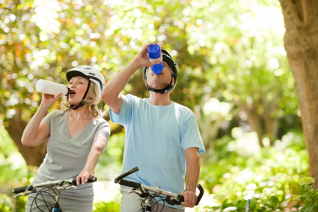 Senior couple drinking water