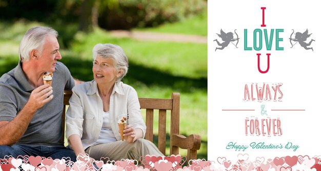 Photo senior couple eating an ice cream on a bench against i love you message