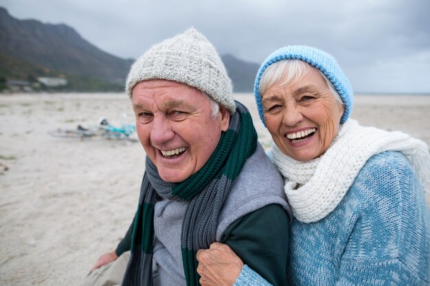 Senior couple having fun together at beach