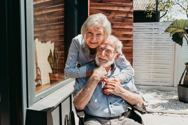 Senior couple at home partner coming back from hospital