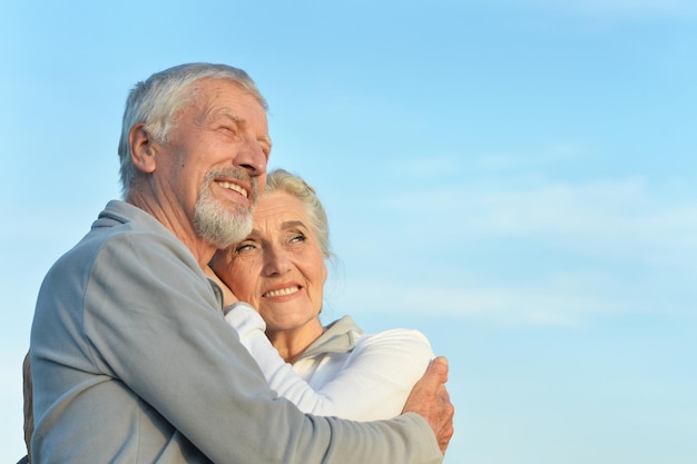 Senior couple hugging