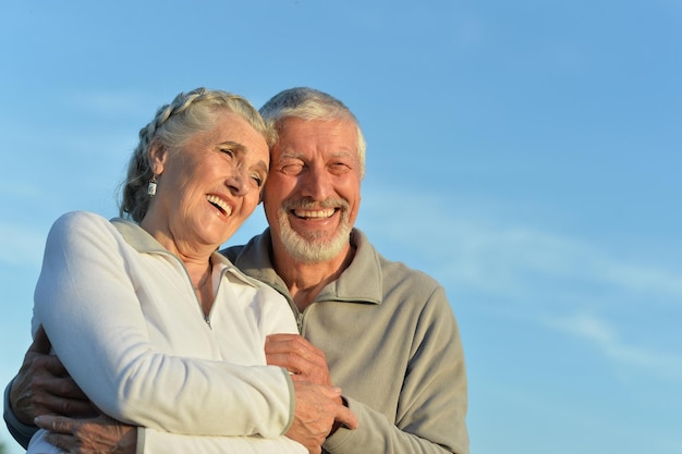 Senior couple hugging