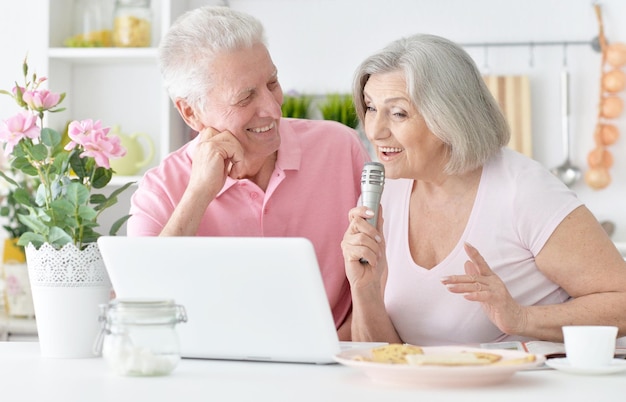 Senior couple husband and wife singing songs