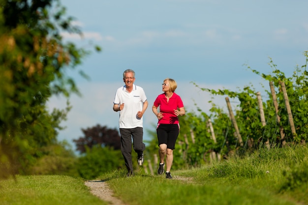 Senior couple jogging for sport