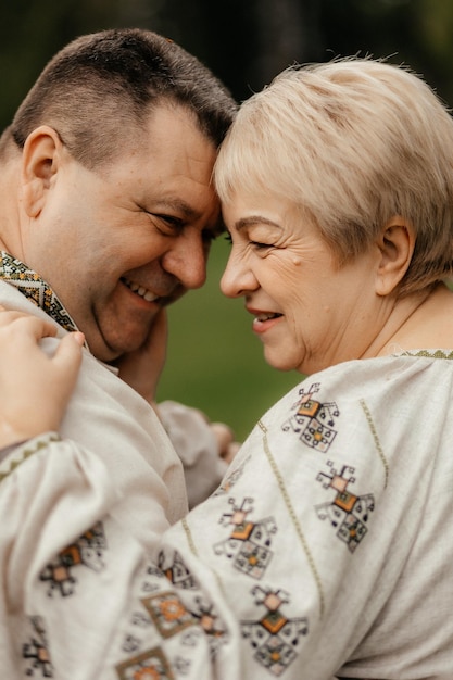 senior couple kissing in spring Happy old age of a family who has lived a long life together