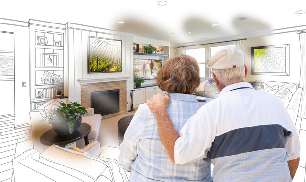 Senior Couple Looking Over Custom Living Room Design Drawing Photo Combination