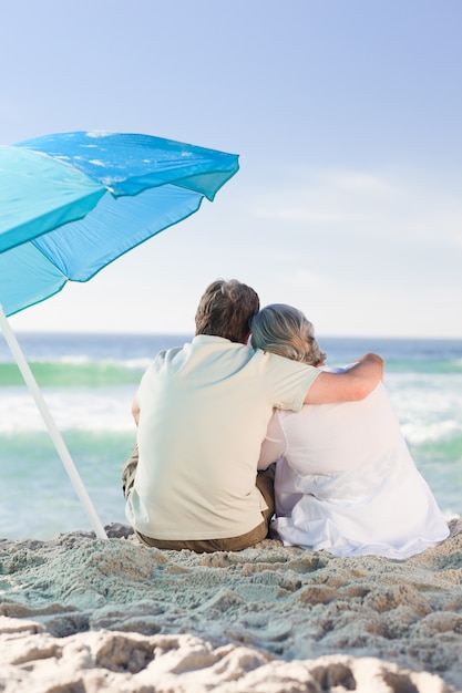 Senior couple looking at the sea