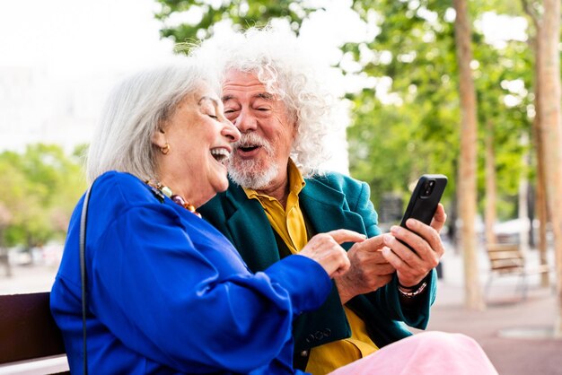 Senior couple of old people dating outdoors