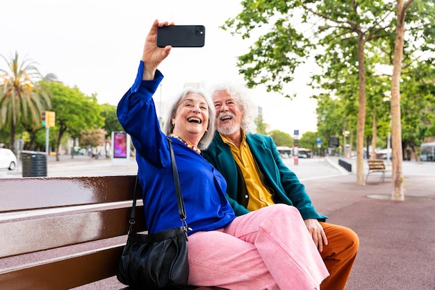 Senior couple of old people dating outdoors