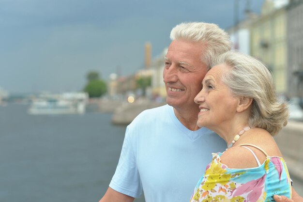 Senior couple posing in city