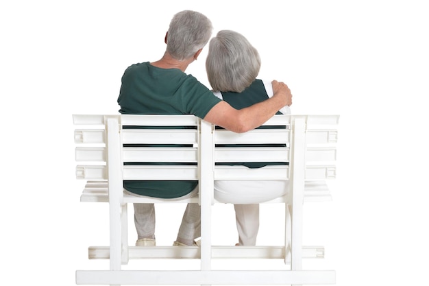 Senior couple posing isolated on white background