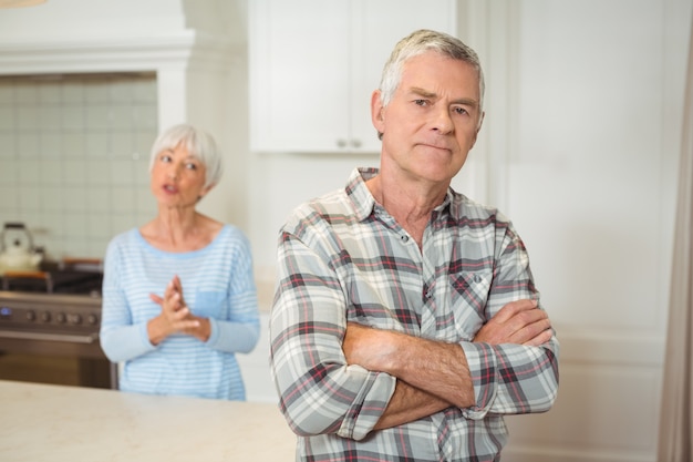 Senior couple quarrelling with each other