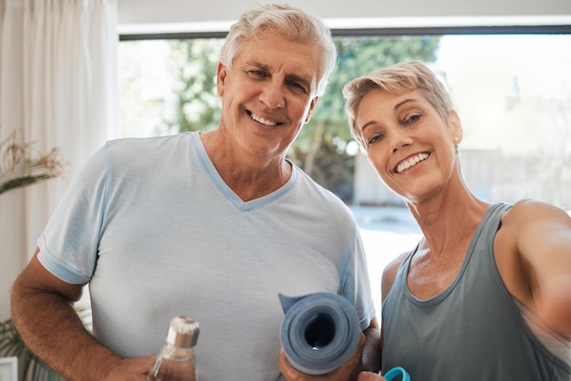 Senior couple selfie or yoga fitness in house or home living room for relax workout training or exercise in lockdown Portrait smile or happy pov of retirement man and wellness woman in photograph