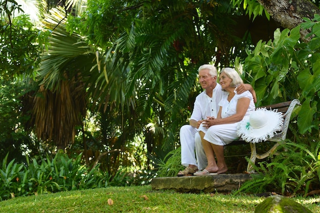 Senior couple sitting on bench