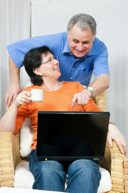 Senior couple surfing Internet