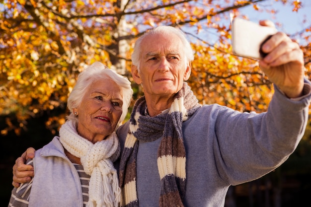 Senior couple taking a selfie