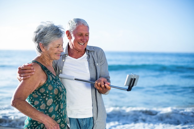 Senior couple taking a selfie